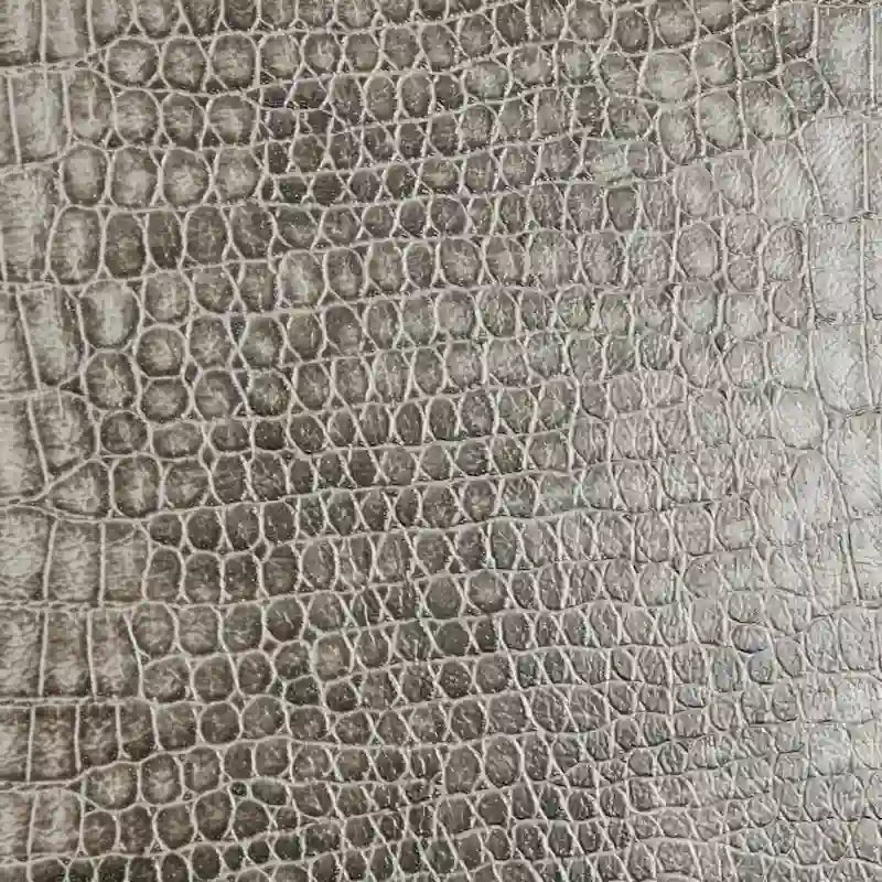 Fauteuil de salon en similicuir et métal